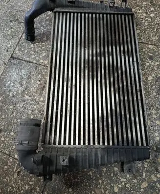 Opel Zafira B Intercooler radiator 13223395