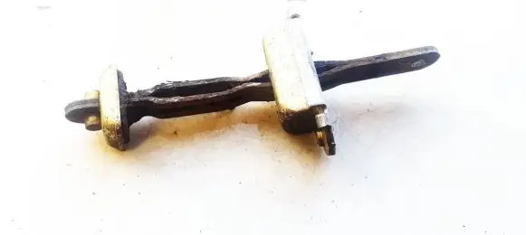 Nissan Almera Front door check strap stopper 
