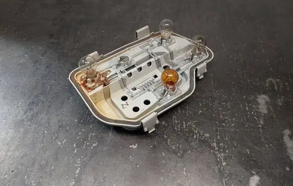 Volkswagen Polo Tail light bulb cover holder 6Q6945258A