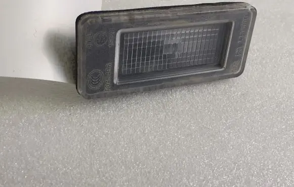 Nissan Qashqai J12 Number plate light A045496 265108990E