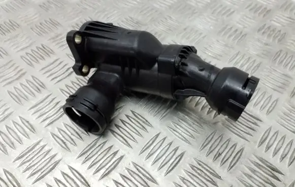 Thermostat/thermostat housing