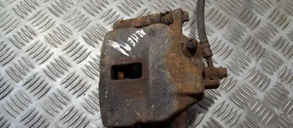 Nissan Almera N16 Front brake caliper