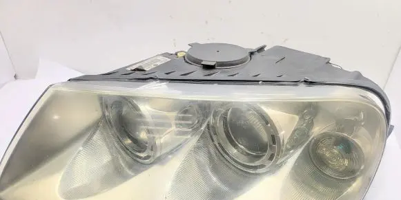 Volkswagen Touareg I Headlight/headlamp 7L6941015BK