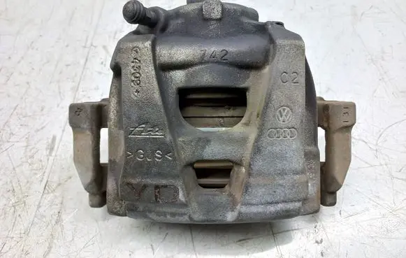 Volkswagen PASSAT B7 USA Front brake caliper