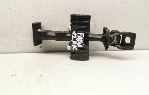 Front door check strap stopper