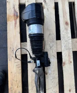Front shock absorber with coil spring