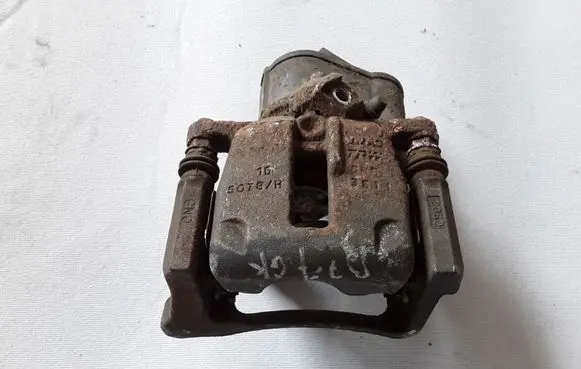 Volkswagen PASSAT B7 Rear brake caliper 5N0615403