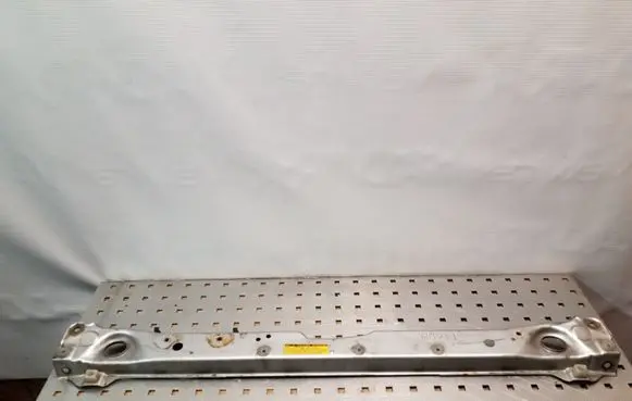Top upper radiator support slam panel