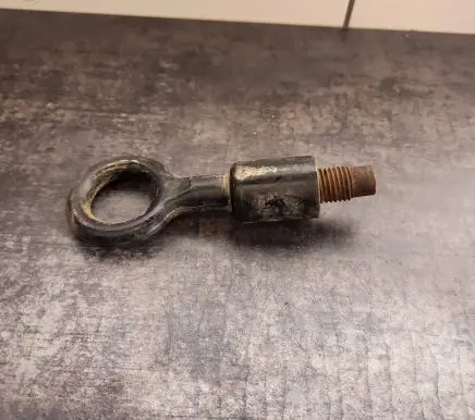 Towing hook eye