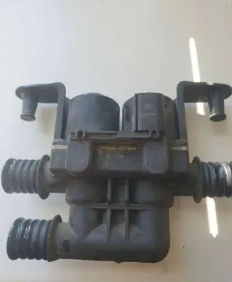 Coolant heater control valve