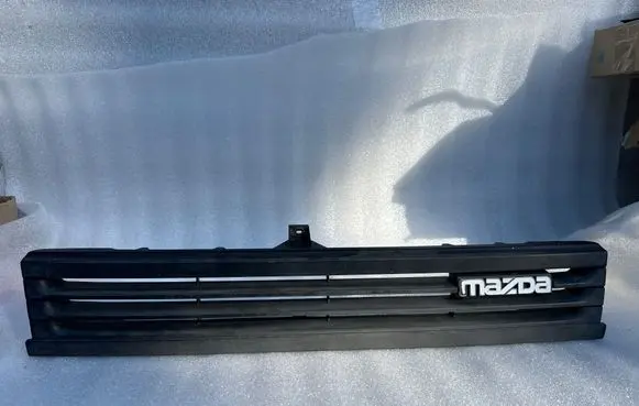 Mazda 323 Bonnet/hood grill B30050711 K2443