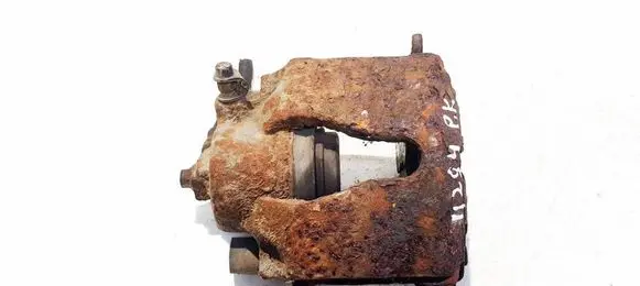 Opel Astra G Front brake caliper 