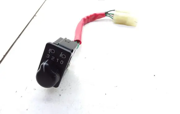 Subaru Impreza I Headlight level height control switch 36240