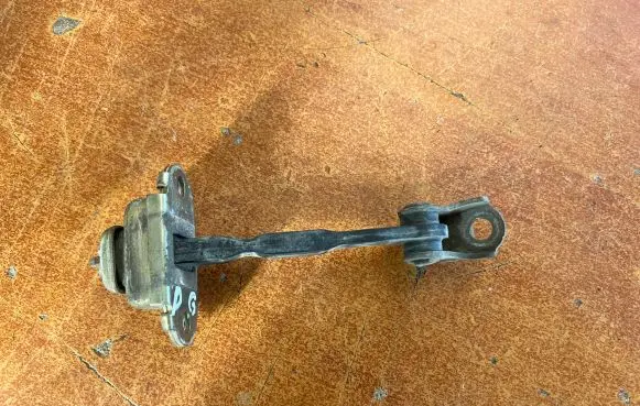 Nissan Almera N16 Rear door check strap stopper