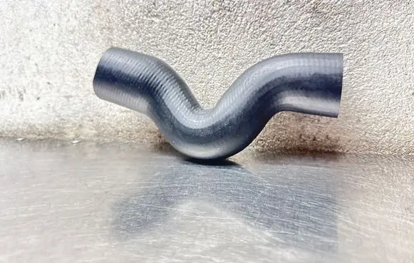 Opel Astra H Coolant pipe/hose 1302499 85636 4043193856364