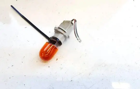 Mazda 3 I Tail light bulb cover holder