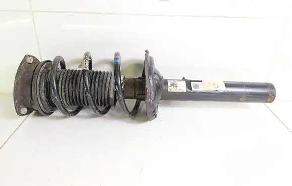 Volkswagen Golf VII Front shock absorber with coil spring 5Q0412014MD 5Q0412014