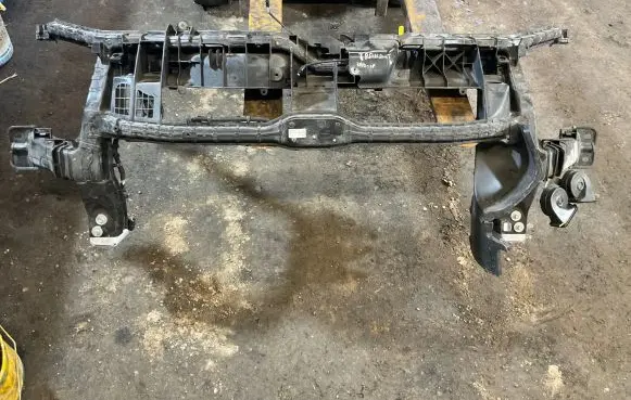 Top upper radiator support slam panel