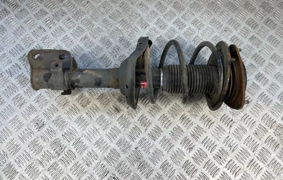 Subaru Legacy Front shock absorber with coil spring