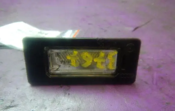 Skoda Fabia Mk2 (5J) Number plate light 8T0943021