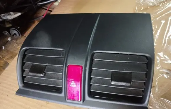 Honda CR-V Dash center air vent grill 77610SWAA0
