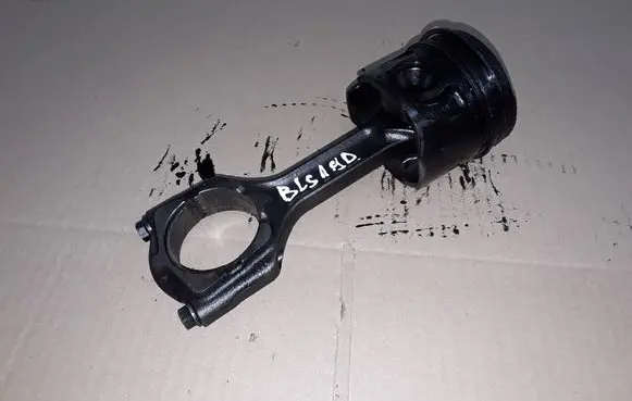 Cadillac BLS Piston with connecting rod 664