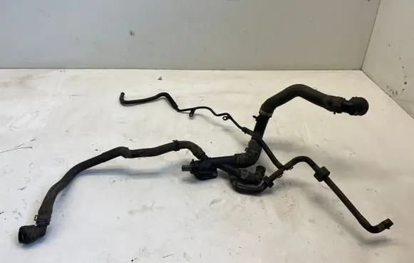 Volkswagen Jetta VI Engine coolant pipe/hose 03L121131AA