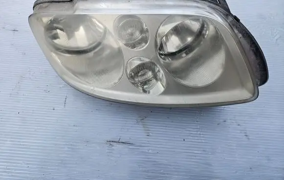 Volkswagen Touran I Headlight/headlamp 0301205202