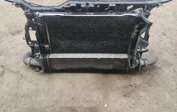 Radiator support slam panel