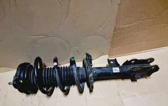 Hyundai Tucson TL Front shock absorber with coil spring 54660D7060