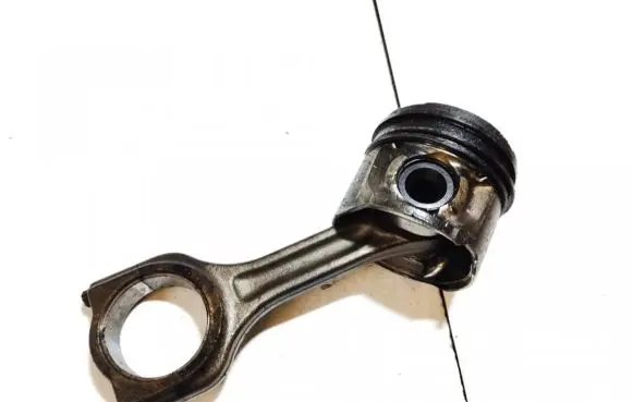 Piston with connecting rod