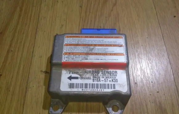 Mazda 323 Airbag control unit/module sas2d b16a-57-k30