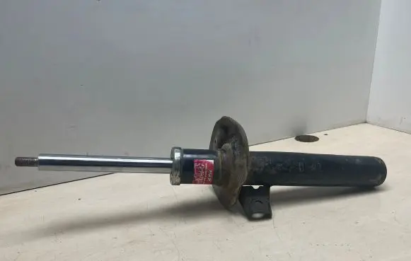 Volkswagen PASSAT B6 Front shock absorber/damper 335808