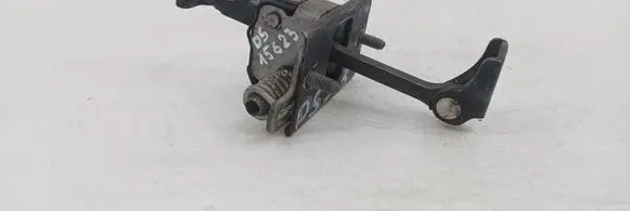 Front door check strap stopper