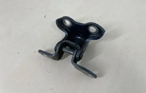 Rear door upper hinge