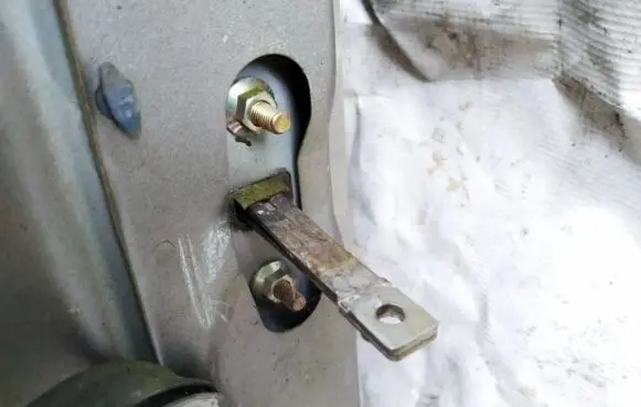 Mazda 121 SM Front door check strap stopper 