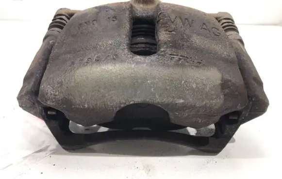 Volkswagen Golf VII Front brake caliper