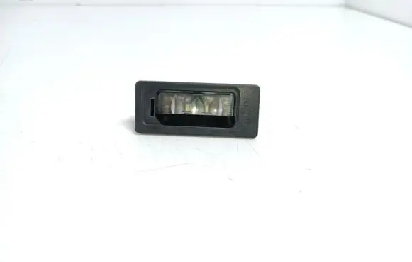 Volkswagen Touareg II Number plate light 3AF943021A