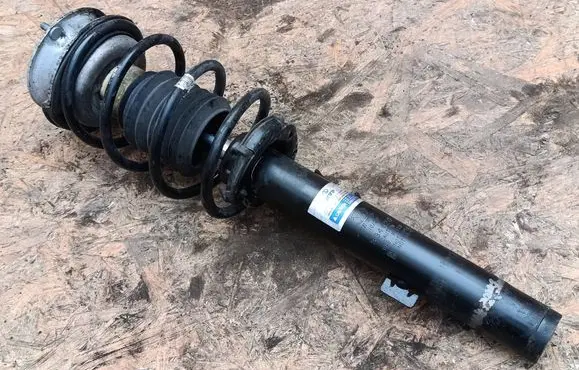 BMW 1 E81 E87 Front shock absorber with coil spring 334626