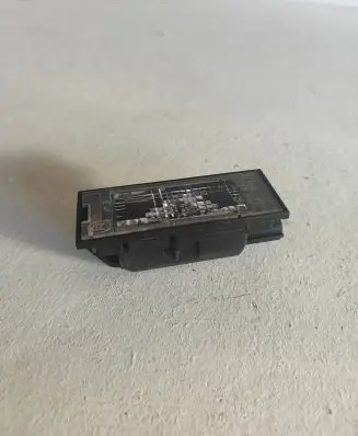 Renault Megane III Number plate light 8200480127