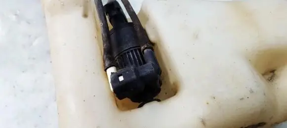 Renault Laguna I Windscreen/windshield washer pump 7700821782