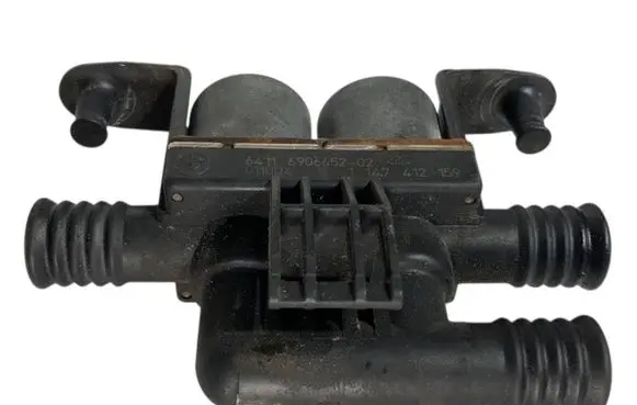 Coolant heater control valve