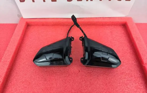 Steering wheel buttons/switches