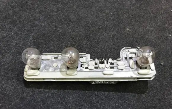 Opel Kadett E Tail light bulb cover holder