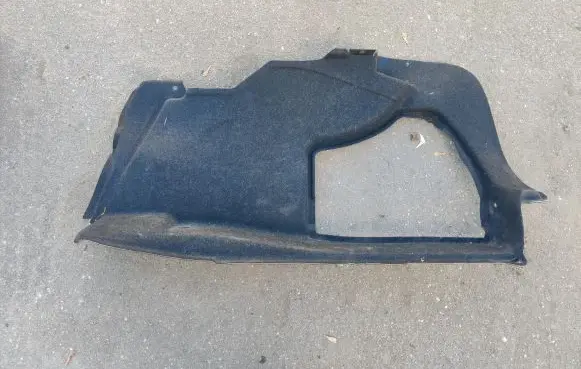Trunk/boot lower side trim panel