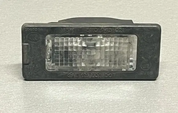 Volkswagen Golf VI Number plate light 1K9943127A