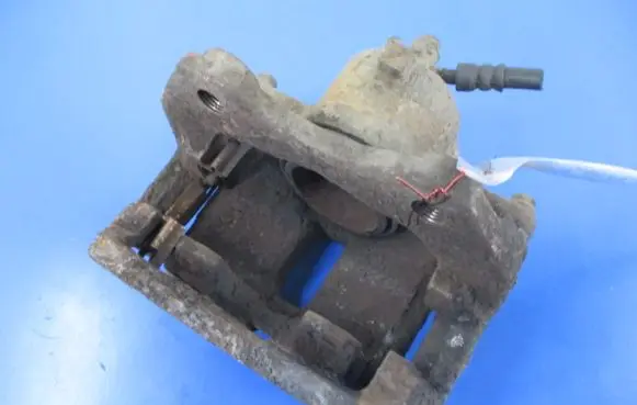 Nissan Almera Tino Front brake caliper