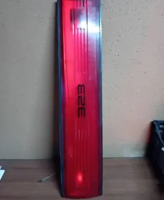Mazda 323 Rear light center trim bar blend 23661602