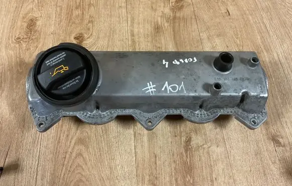 Volkswagen Golf IV Rocker cam cover 038103469E