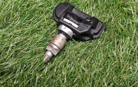 Opel Astra J Tire pressure sensor 13581560